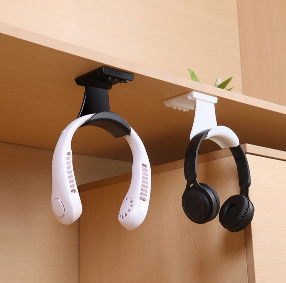 Headset holders sticking to wall (different colors)